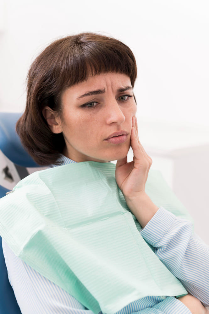 Paciente Con La Muela Del Juicio Infectada que tiene que acudir al dentista